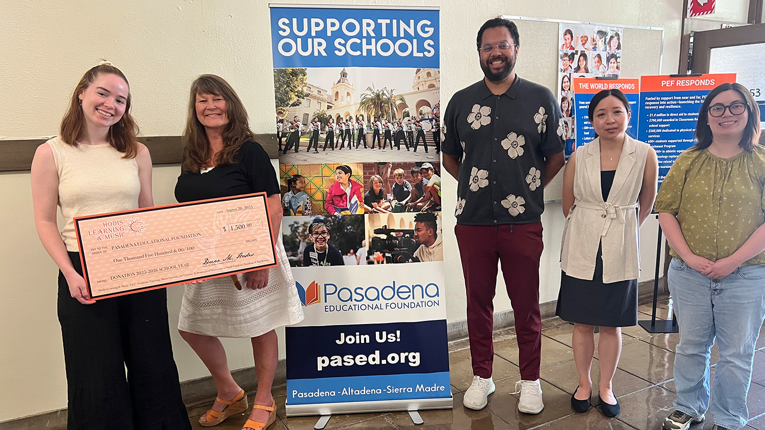 Pasadena tutor donates check to PEF Pasadena Education Foundation